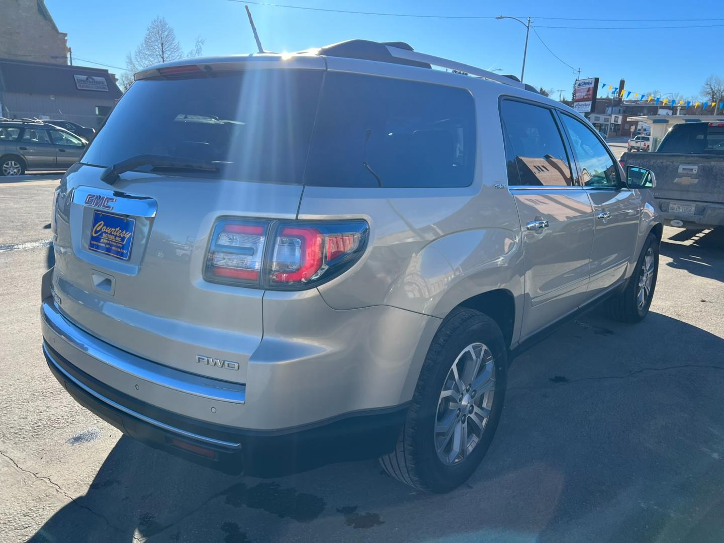 2016 Beige /Charcoal GMC Acadia SLT (1GKKVRKD2GJ) with an 3.6L V6 engine, automatic transmission, located at 116 5th Avenue South, Lewistown, MT, 59457, 47.063877, -109.427879 - Clean local trade with lots of options! Heated leather, sunroof, DVD! - Photo#1